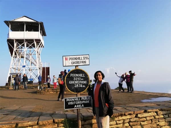 Trekkers witnessing sunrise over the Annapurna range